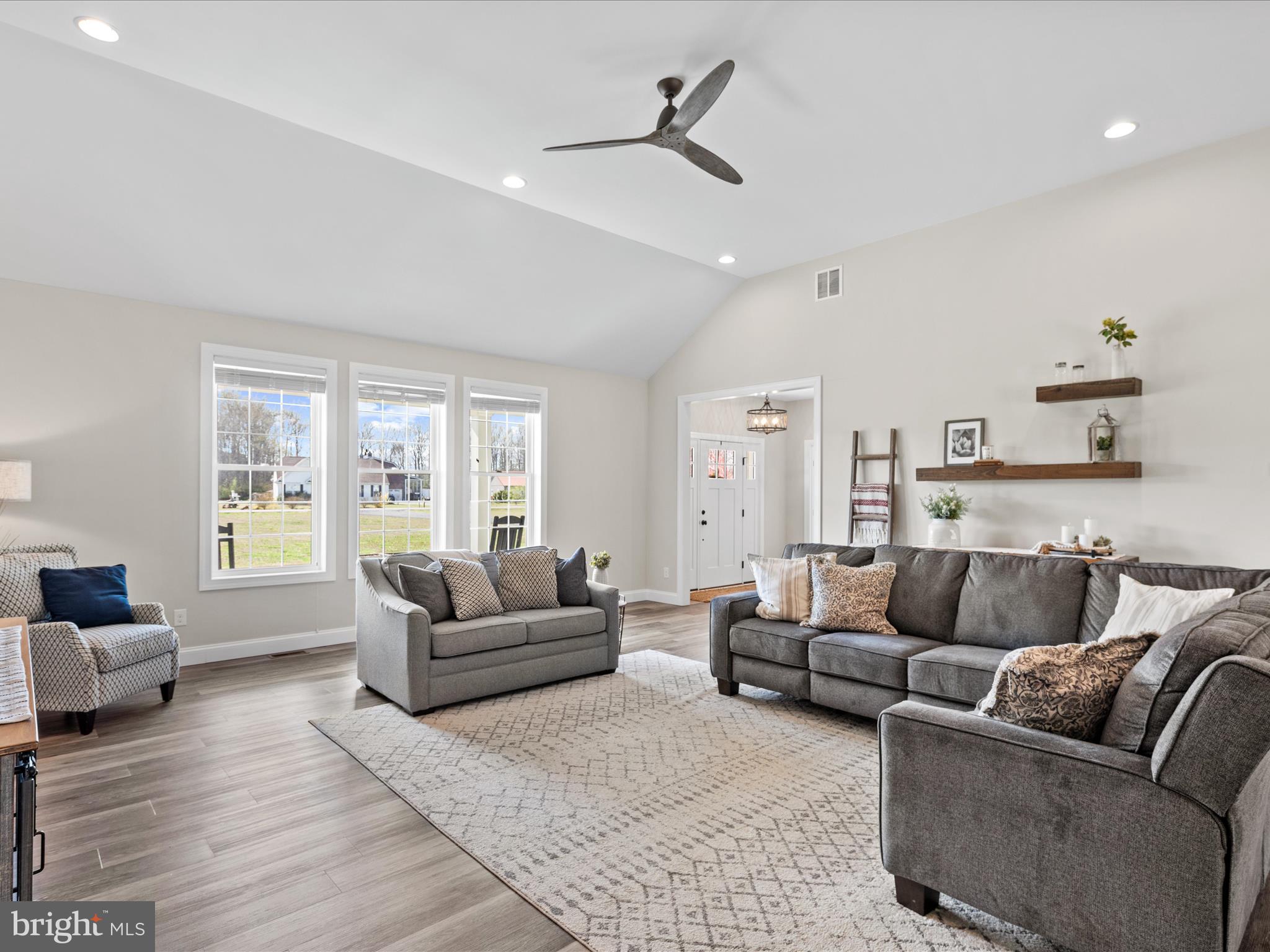 20355 Cool Spring Road Milton, DE 19968 - Photo 7 of 54 a living room with furniture and a large window