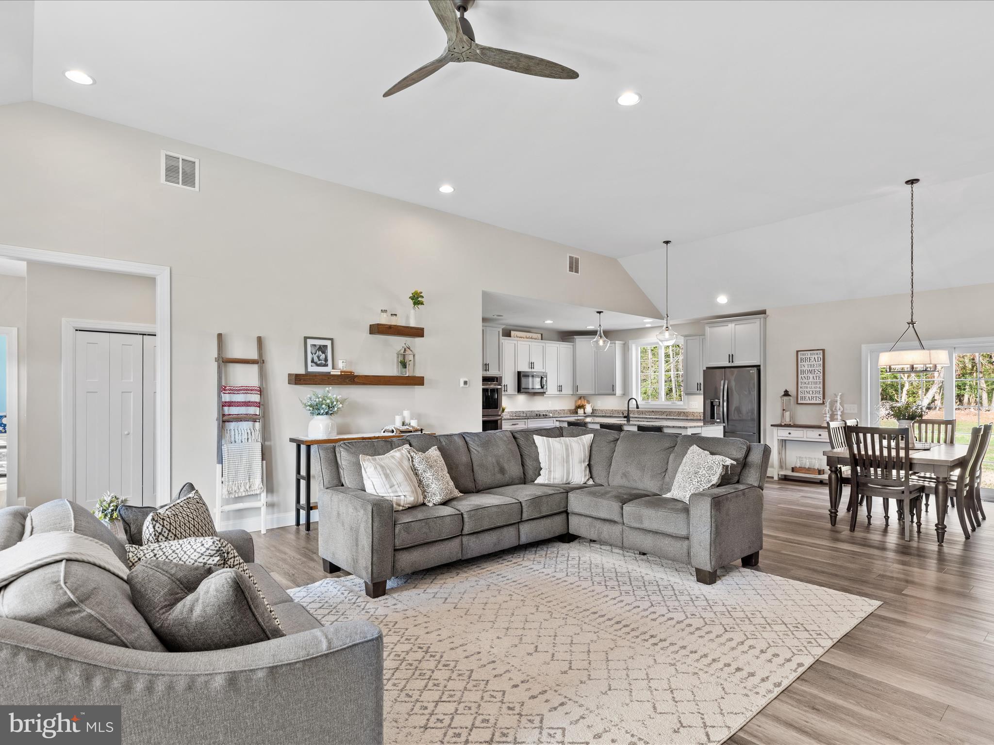 20355 Cool Spring Road Milton, DE 19968 - Photo 8 of 54 a living room with furniture kitchen view and a wooden floor