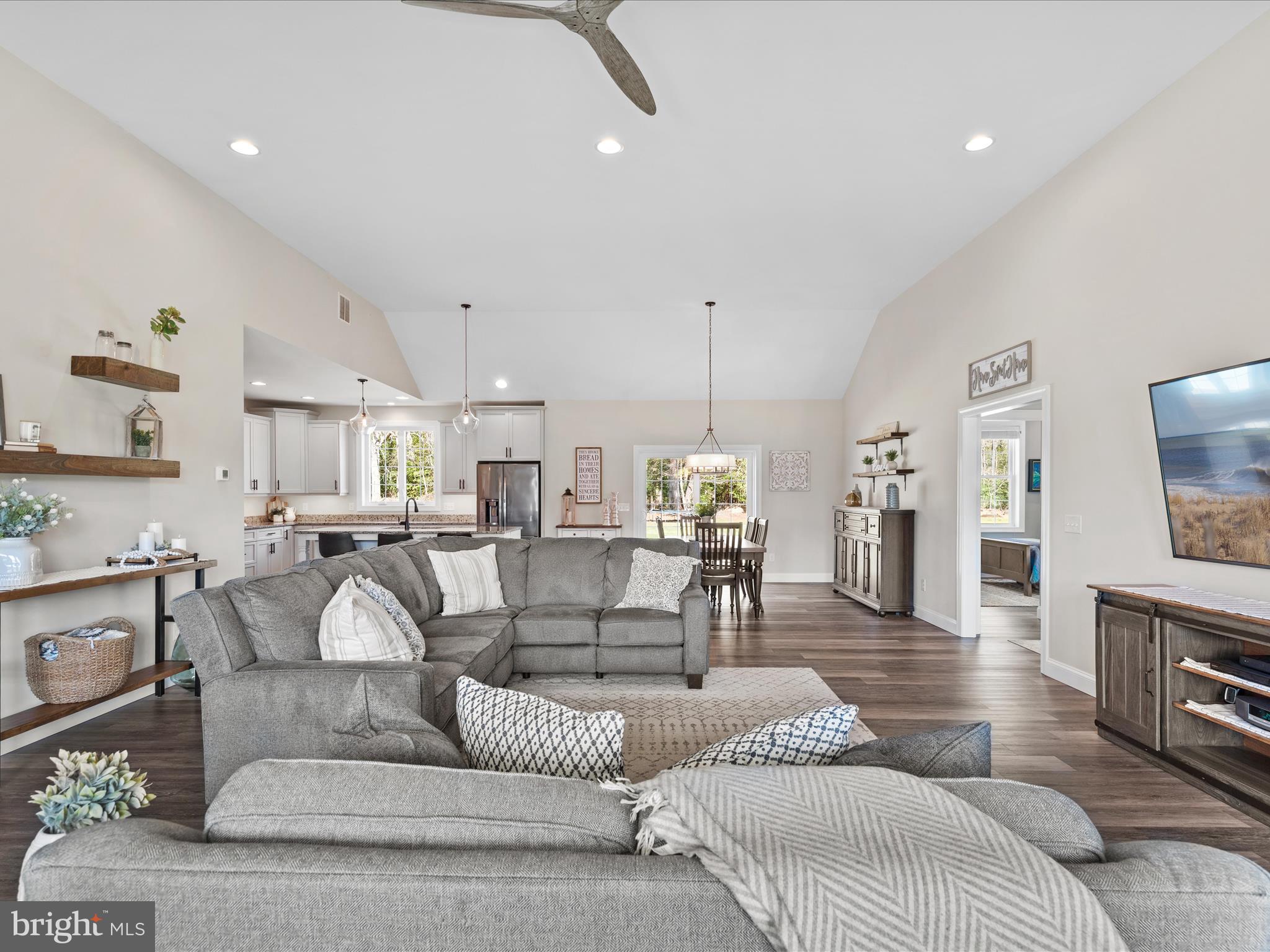 20355 Cool Spring Road Milton, DE 19968 - Photo 9 of 54 a living room with furniture and a fireplace