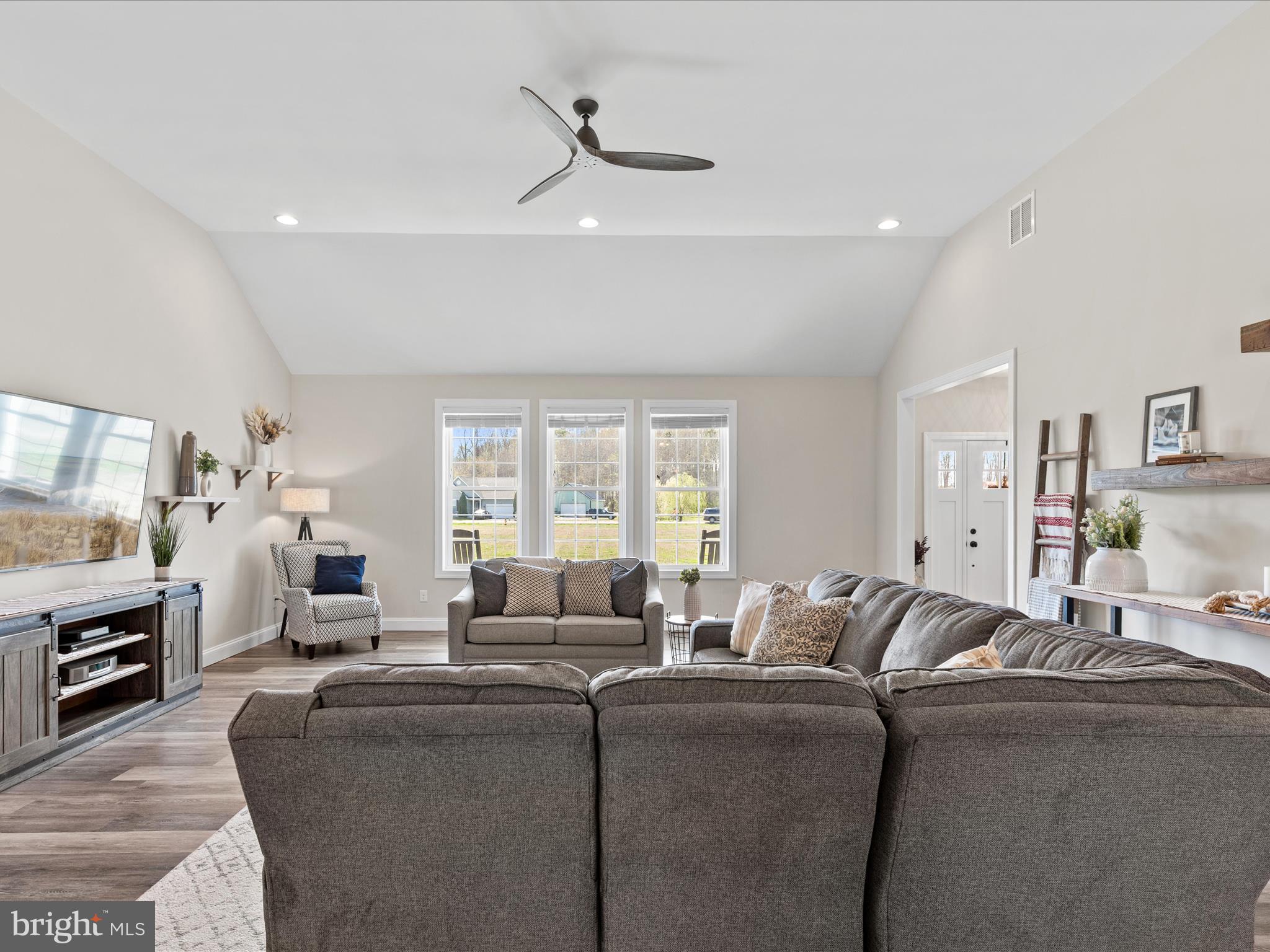 20355 Cool Spring Road Milton, DE 19968 - Photo 10 of 54 a living room with furniture and a large window