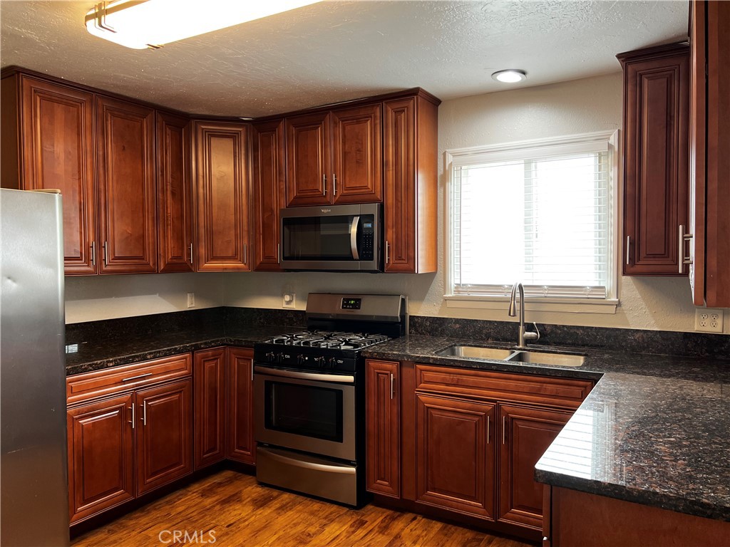 910 South Rancho Avenue Colton, CA 92324 - Photo 15 of 27 Kitchen with stainless appliances