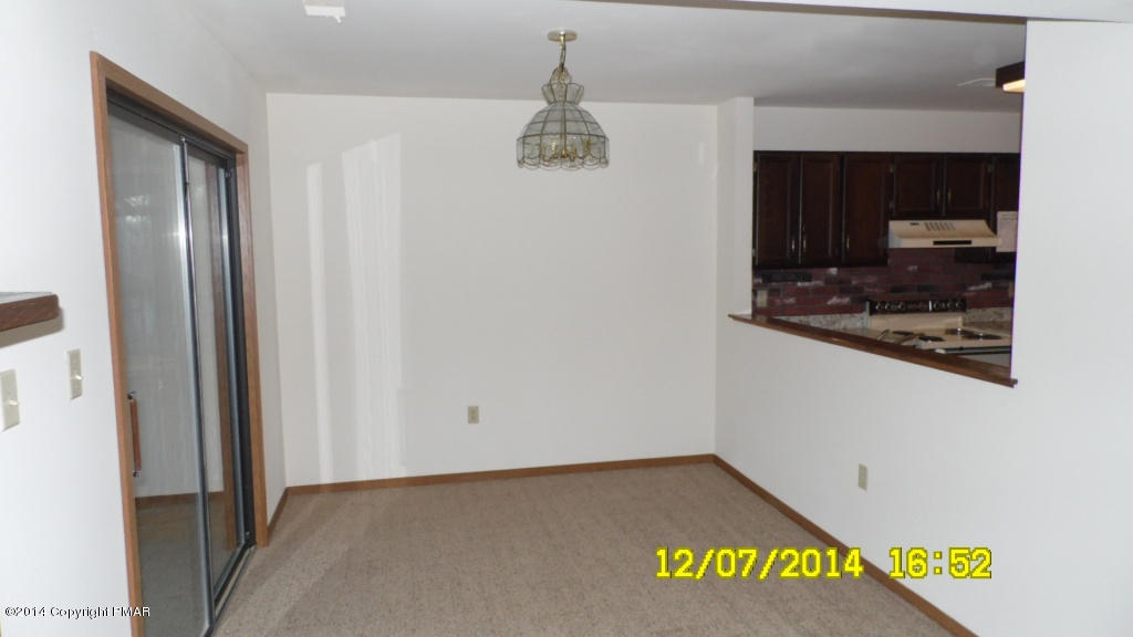 216 Falls Circle Bushkill, PA 18324 - Photo 3 of 11 a view of a hallway to a bedroom
