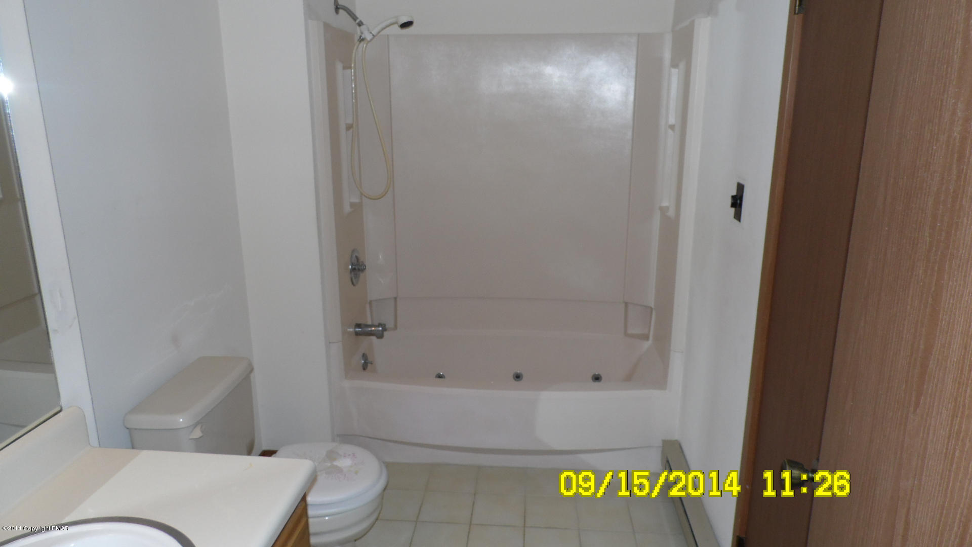 216 Falls Circle Bushkill, PA 18324 - Photo 6 of 11 a bathroom with a bathtub and shower