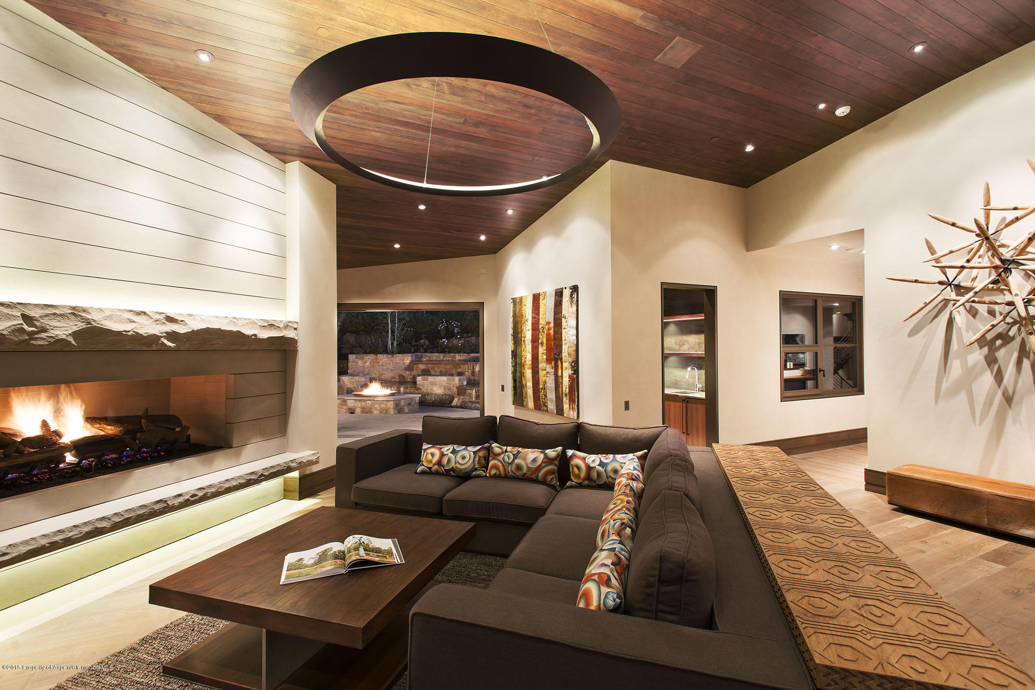 101 Oak Ridge Drive Aspen, CO 81611 - Photo 5 of 18 a living room with furniture and a fireplace