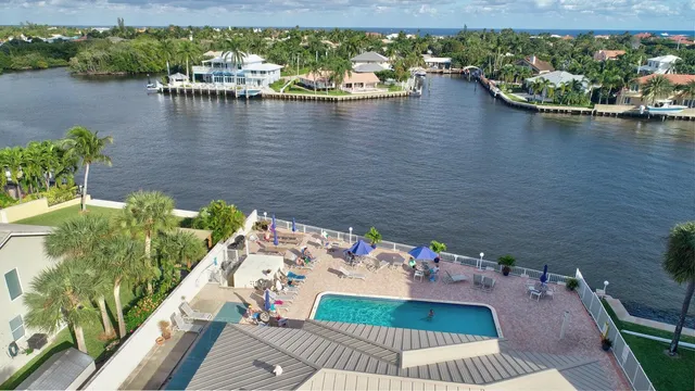 a view of a swimming pool with an ocean view
