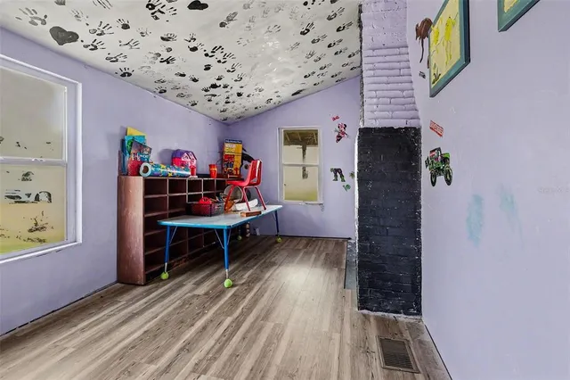 a view of livingroom with furniture and toys