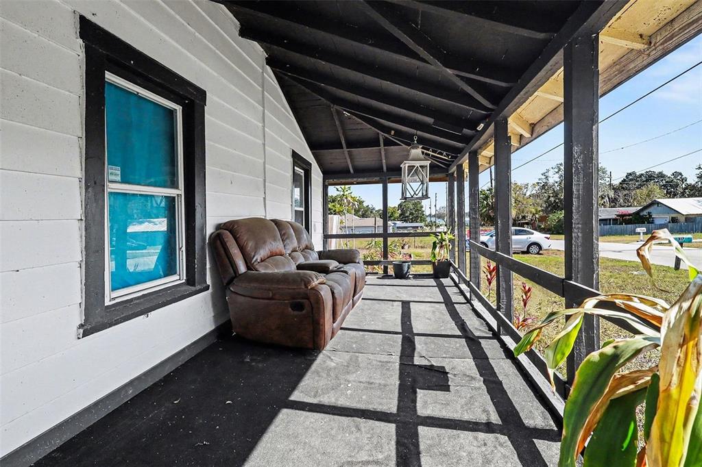 Undisclosed Address Frostproof, FL 33843 - Photo 19 of 22 a living room with furniture and a table