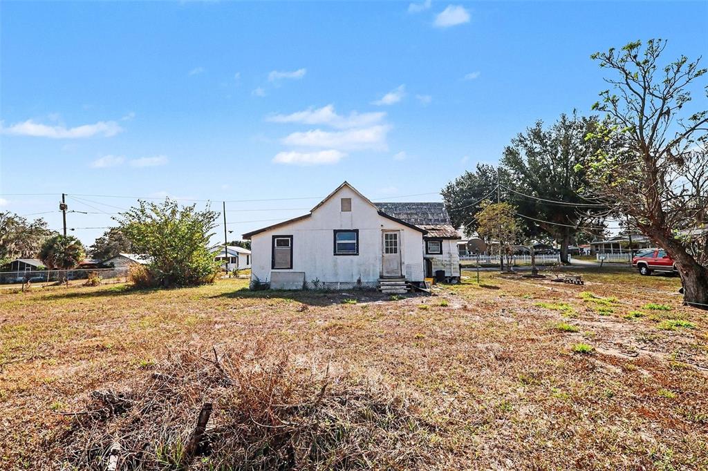 Undisclosed Address Frostproof, FL 33843 - Photo 21 of 22 a house view with a outdoor space