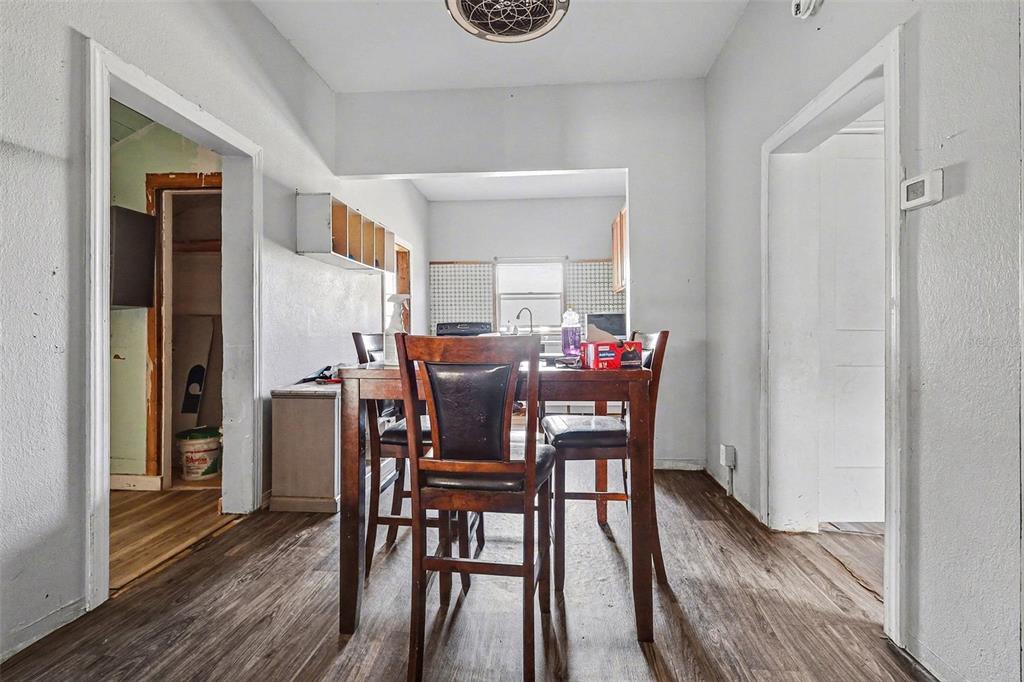 Undisclosed Address Frostproof, FL 33843 - Photo 7 of 22 a view of a dining room with furniture and wooden floor