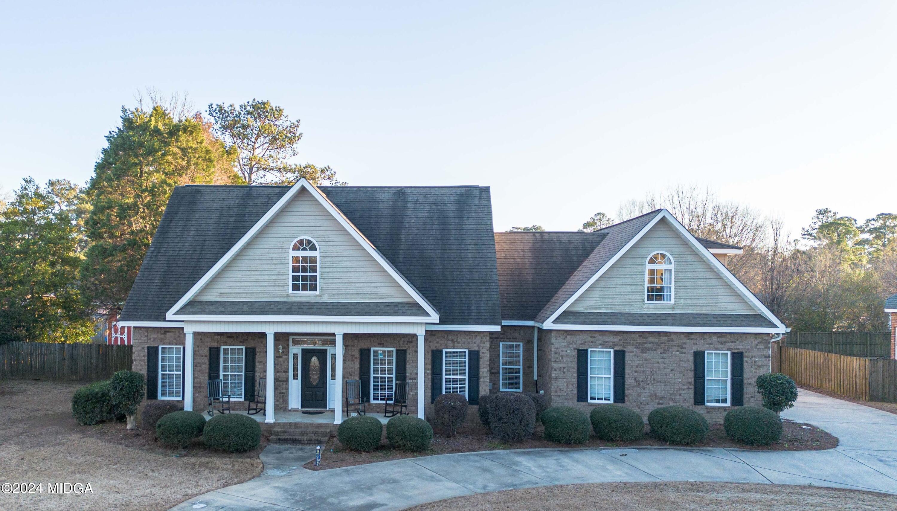 105 Windermere Circle Perry, GA 31069 - Photo 1 of 48 a front view of a house with a yard