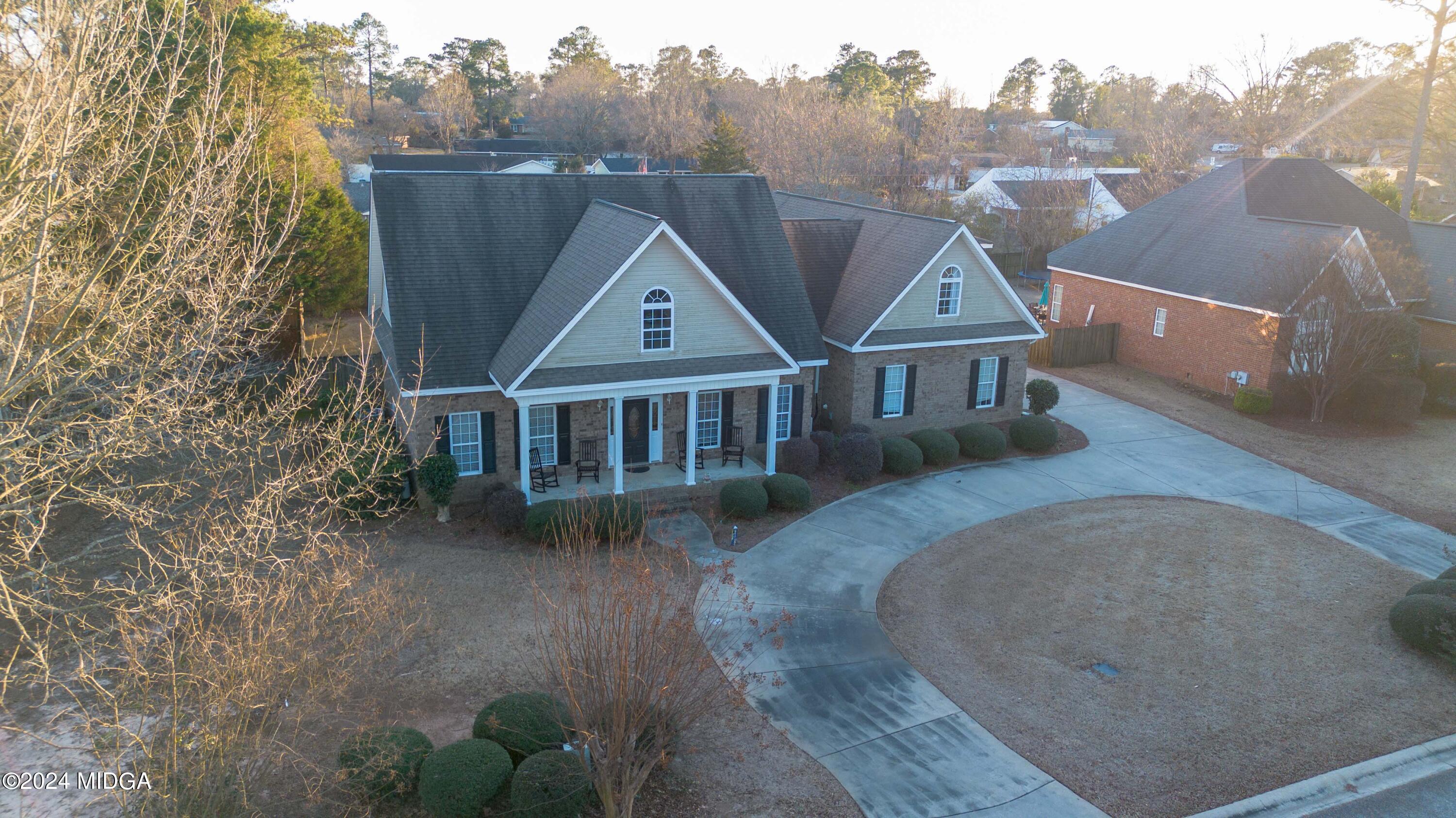 105 Windermere Circle Perry, GA 31069 - Photo 3 of 48 an aerial view of a house with a yard