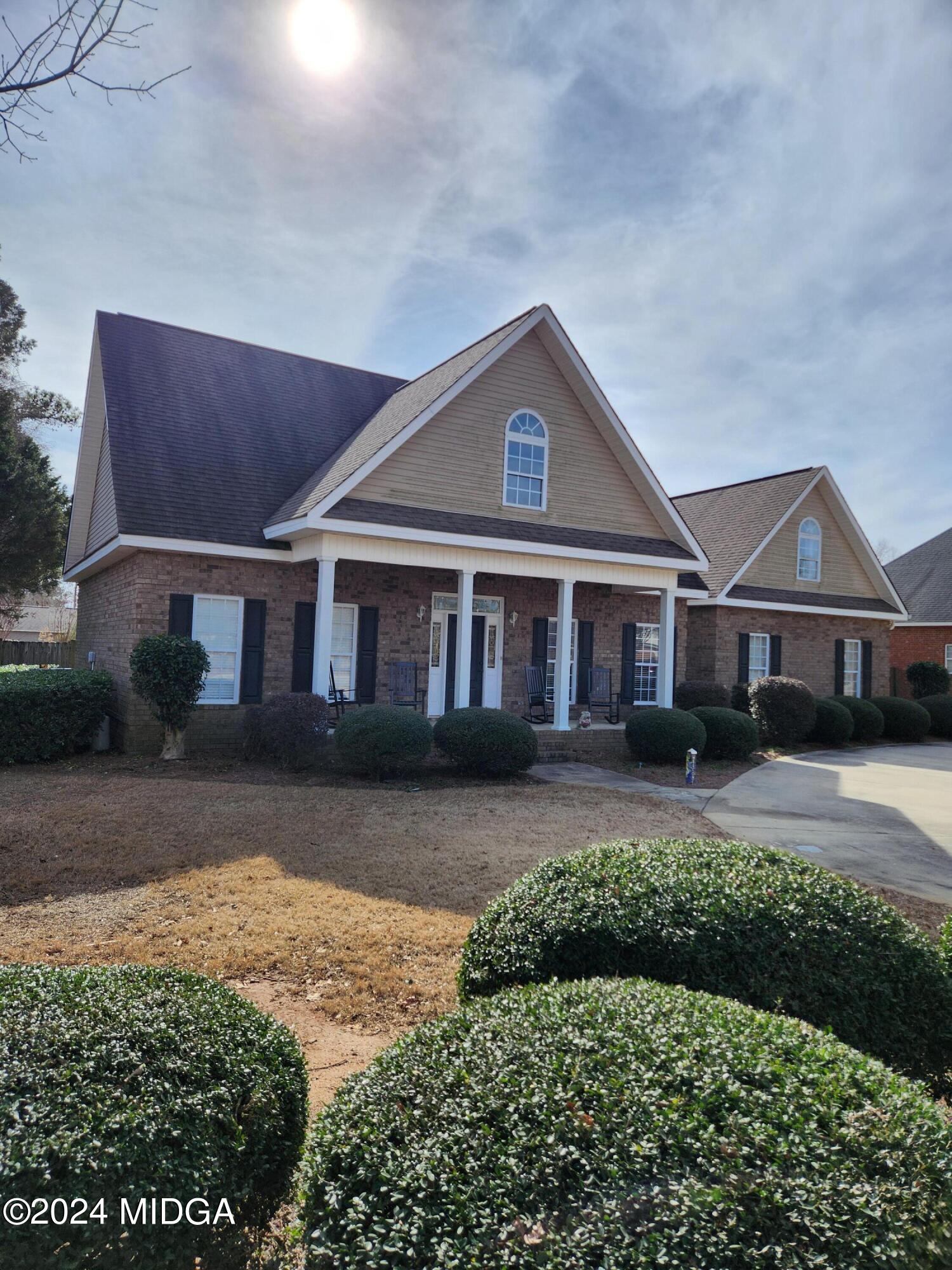 105 Windermere Circle Perry, GA 31069 - Photo 37 of 48 a front view of a house with a yard
