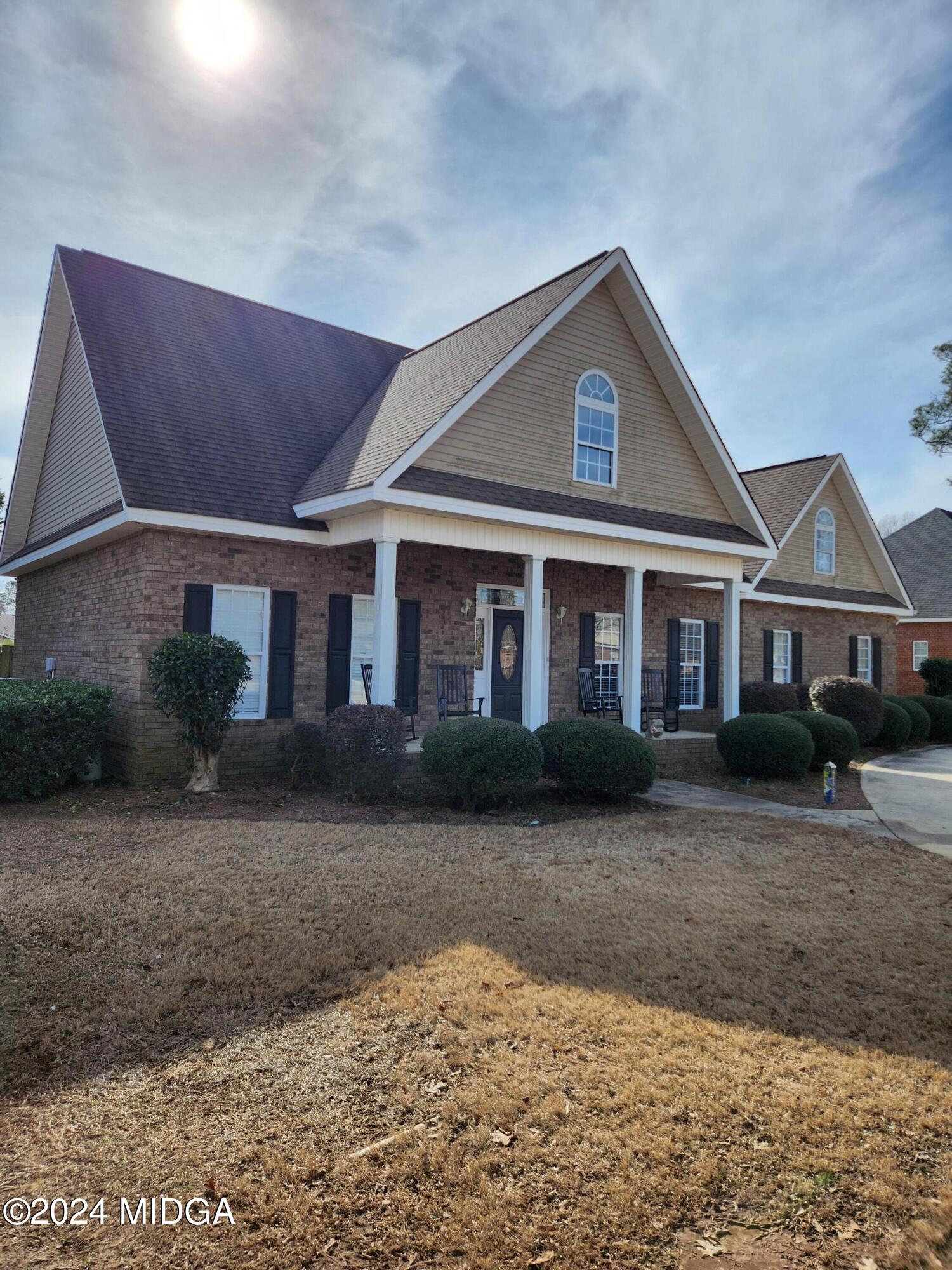 105 Windermere Circle Perry, GA 31069 - Photo 38 of 48 a front view of a house with a yard