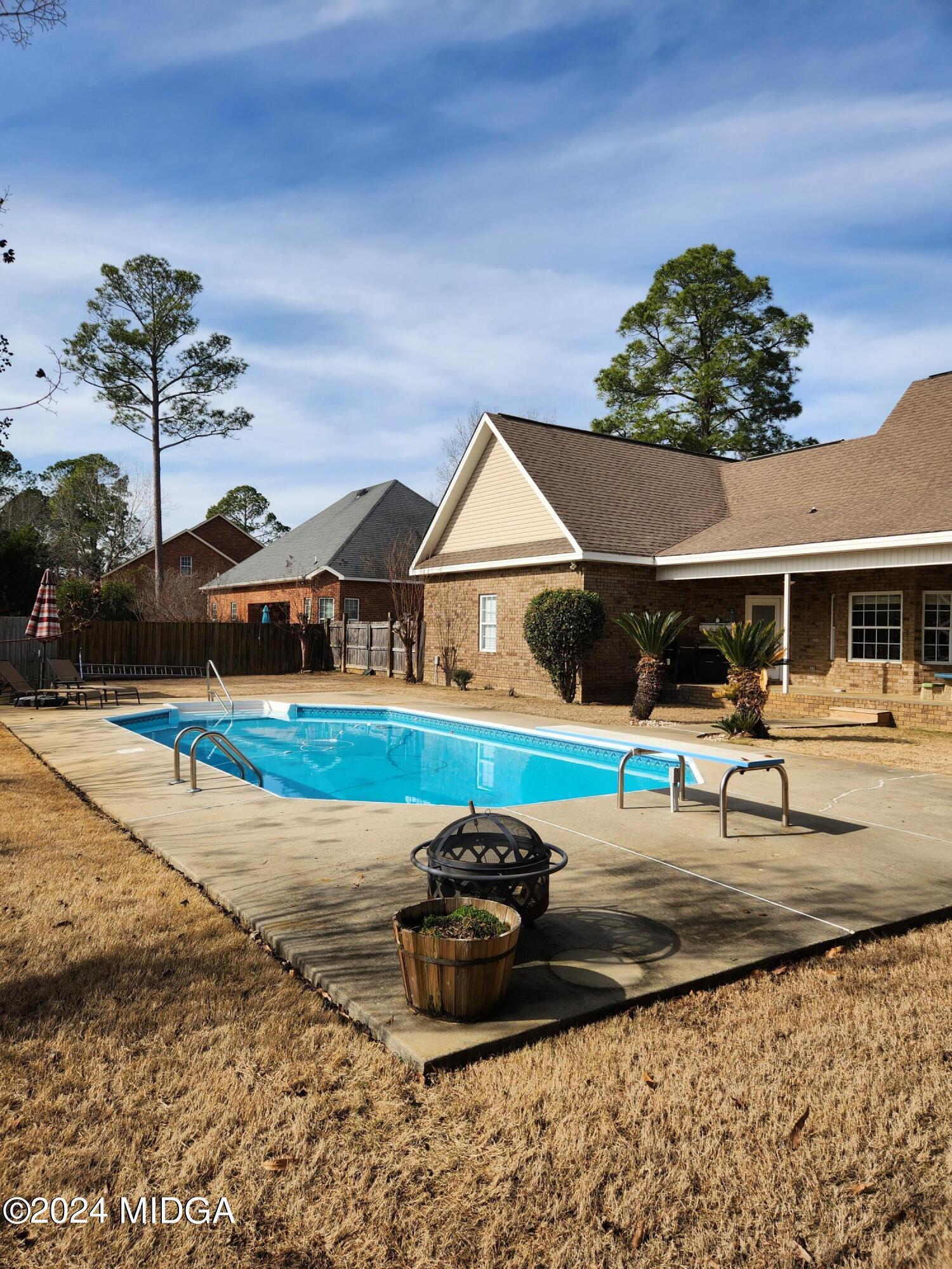 105 Windermere Circle Perry, GA 31069 - Photo 39 of 48 a view of a house with backyard and sitting area