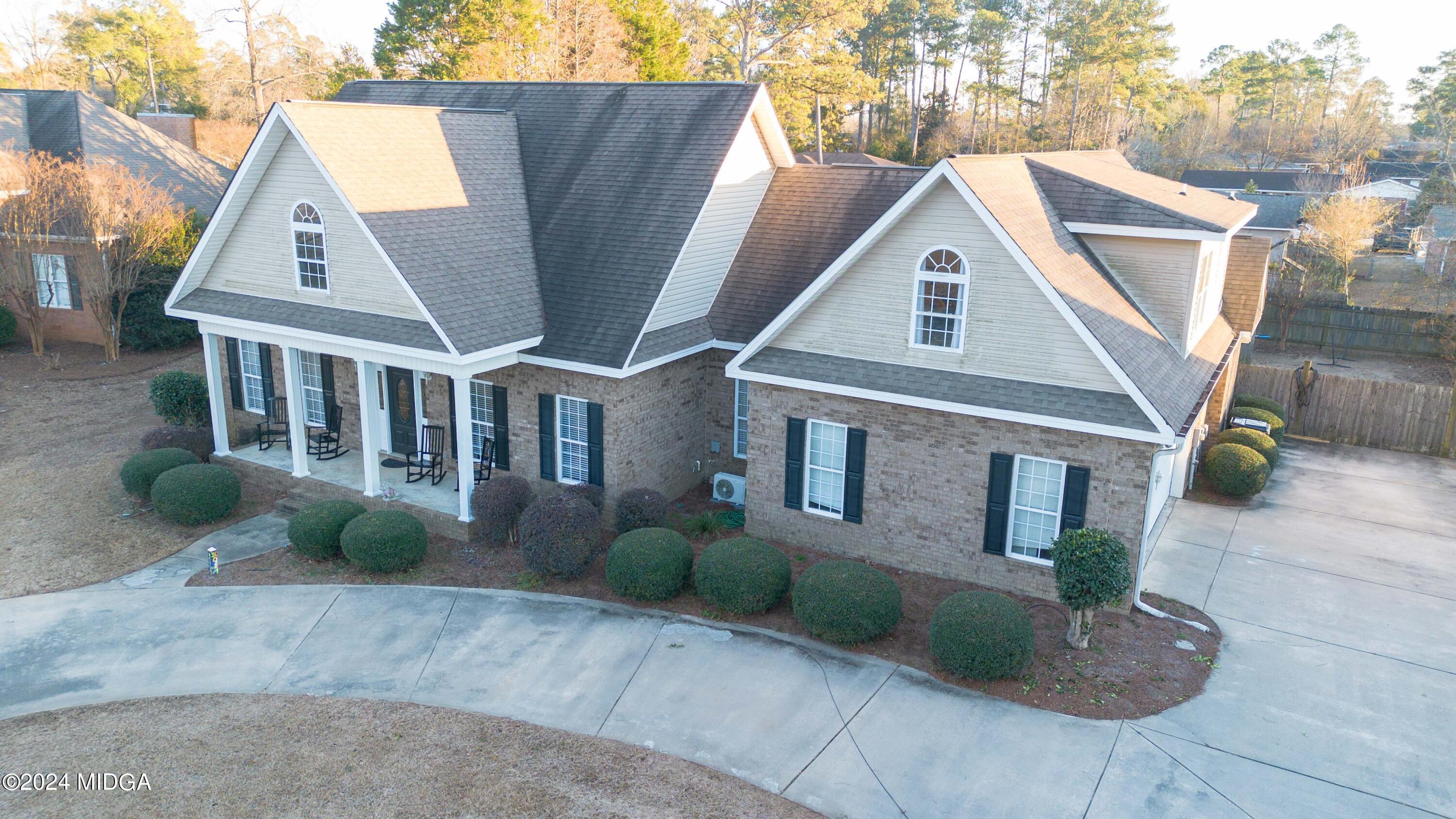 105 Windermere Circle Perry, GA 31069 - Photo 4 of 48 a aerial view of a house next to a yard