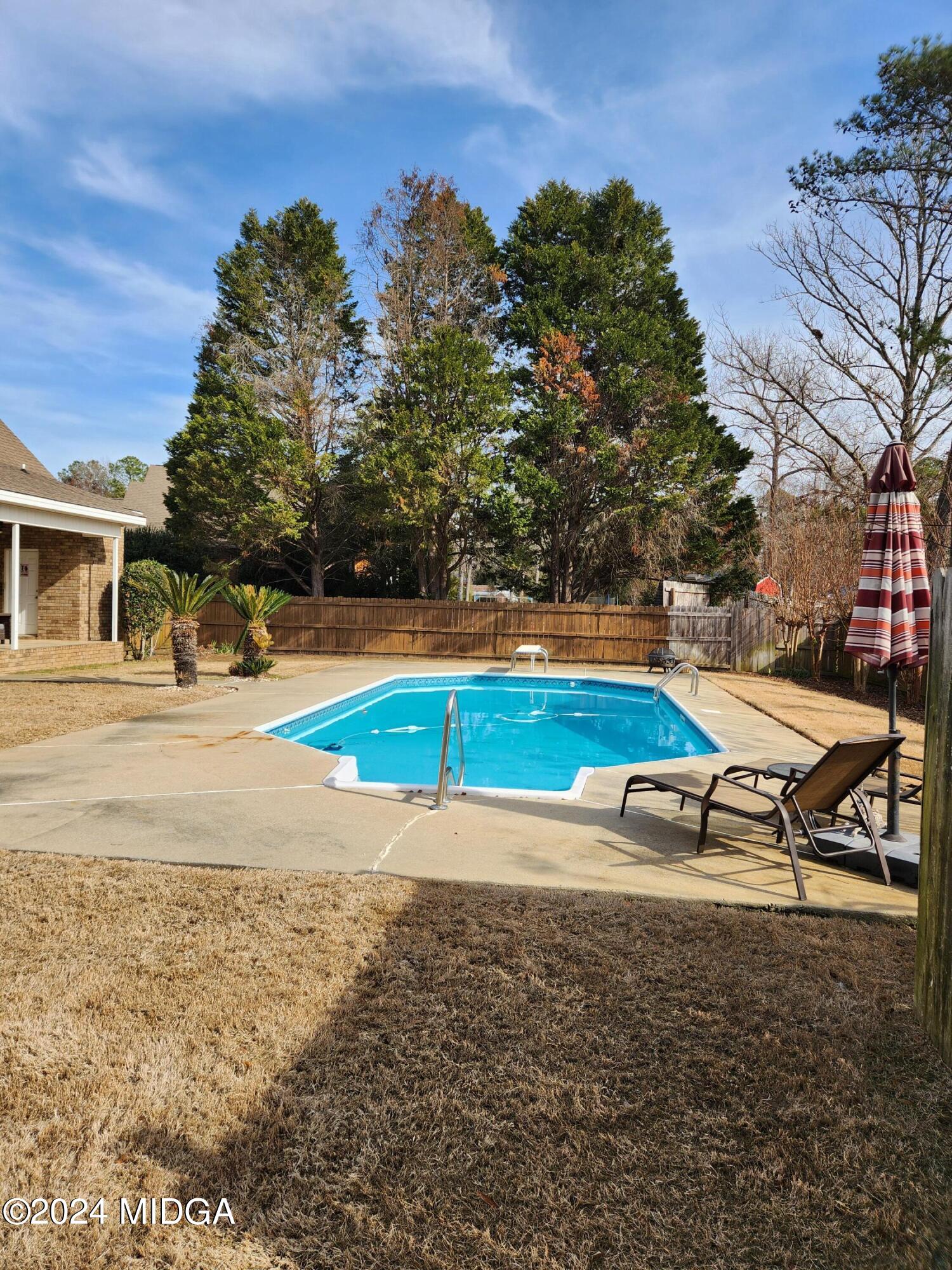 105 Windermere Circle Perry, GA 31069 - Photo 43 of 48 a view of outdoor space with swimming pool and lounge chair