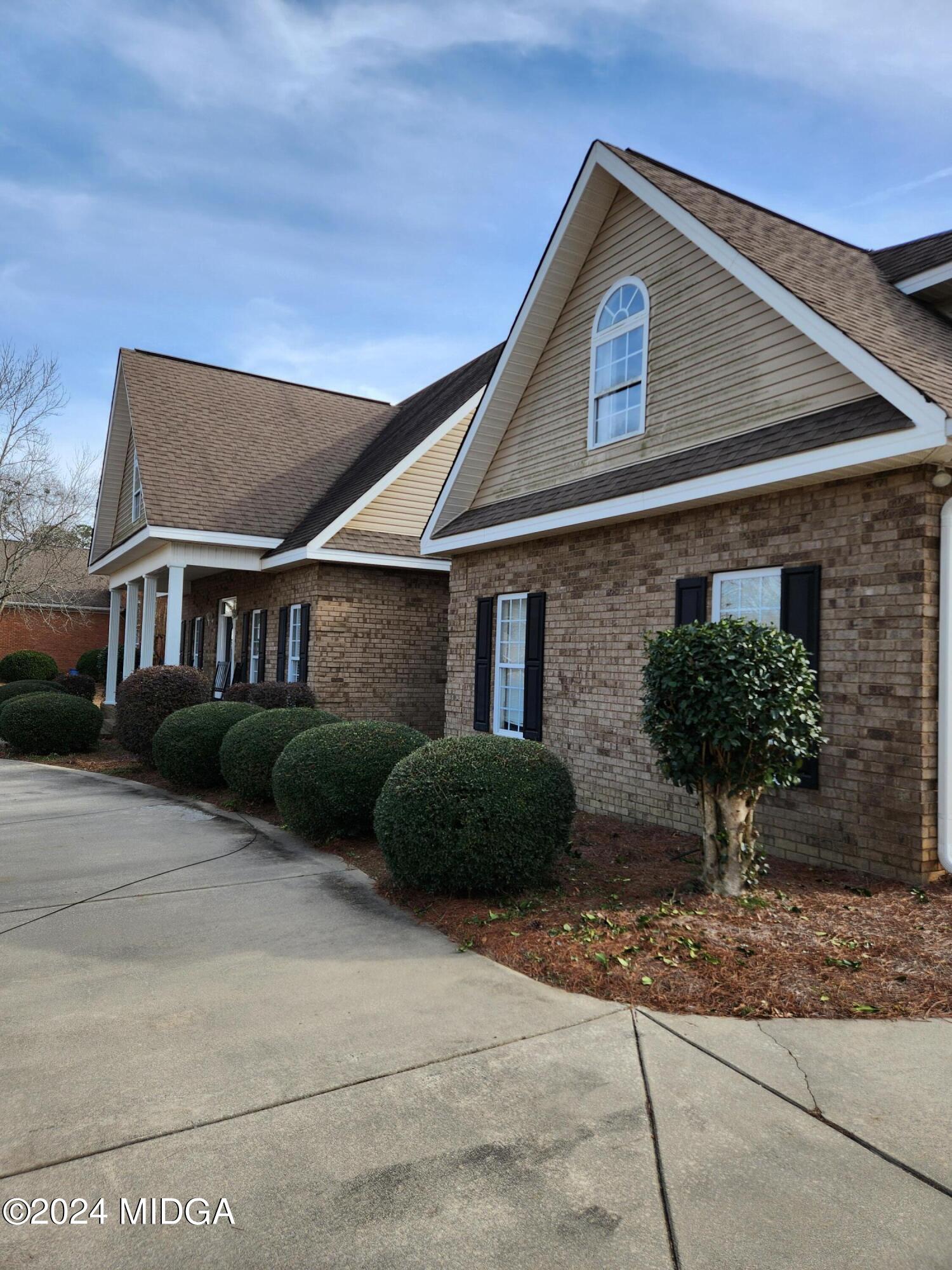 105 Windermere Circle Perry, GA 31069 - Photo 47 of 48 a front view of a house with a yard