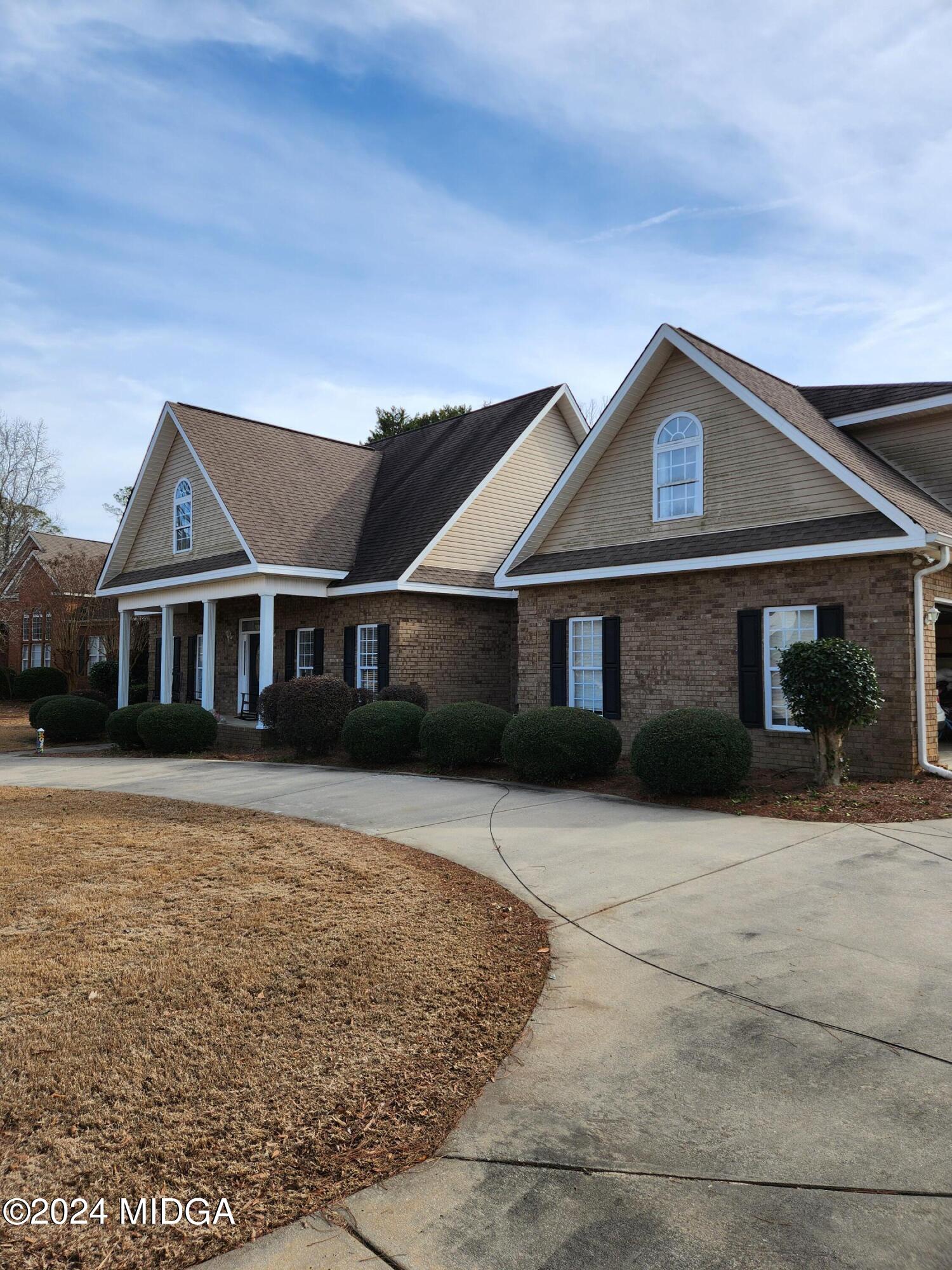 105 Windermere Circle Perry, GA 31069 - Photo 48 of 48 a front view of a house with a yard