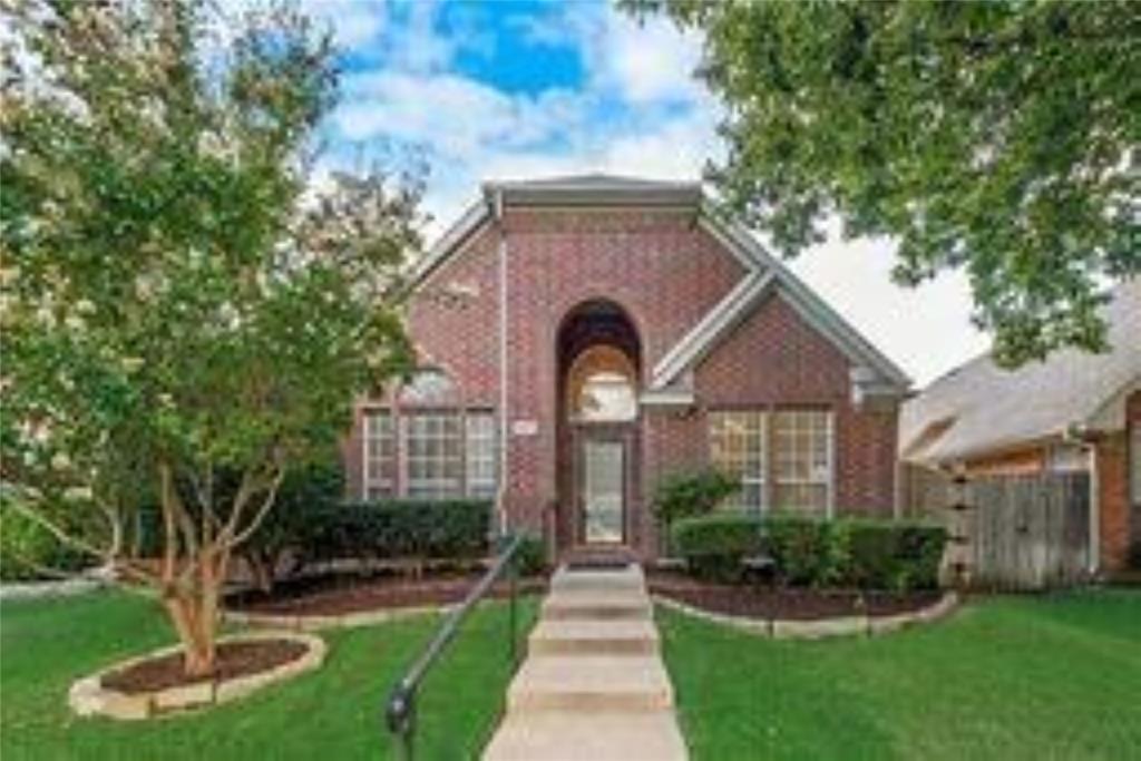 8417 Catskill Court Plano, TX 75025 - Photo 2 of 17 a front view of a house with garden