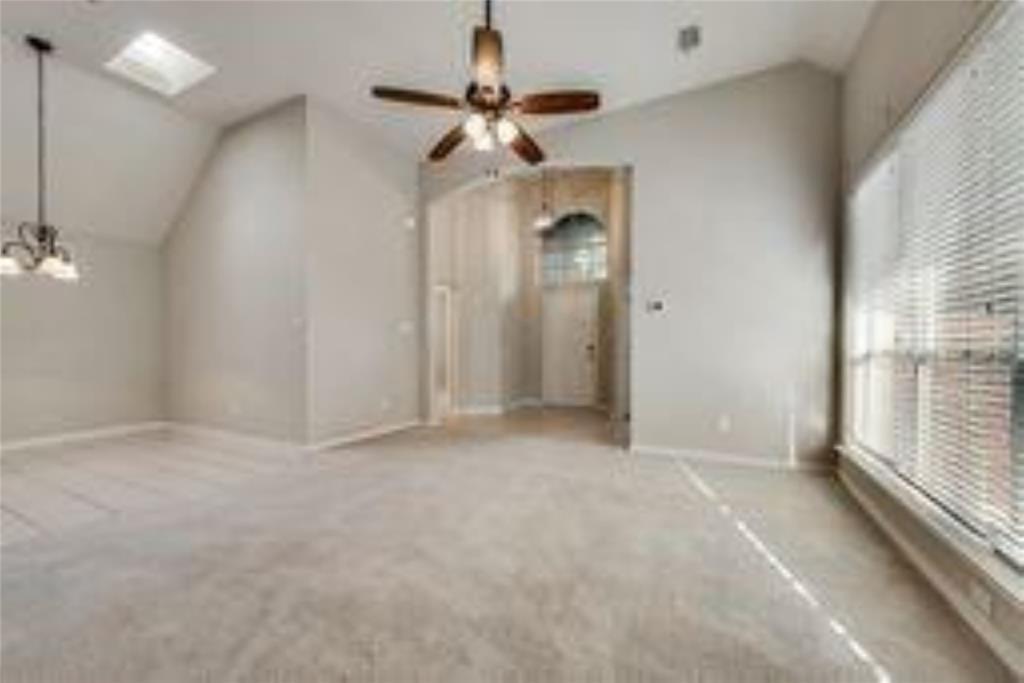 8417 Catskill Court Plano, TX 75025 - Photo 8 of 17 a view of an empty room with a window