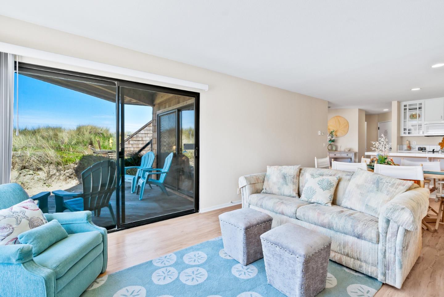 101 Shell Road, Unit 108 Watsonville, CA 95076 - Photo 12 of 38 a living room with furniture and a floor to ceiling window