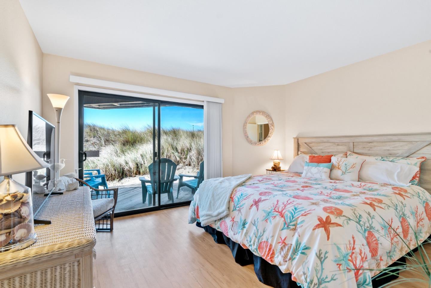 101 Shell Road, Unit 108 Watsonville, CA 95076 - Photo 22 of 38 a bedroom with a bed and large window