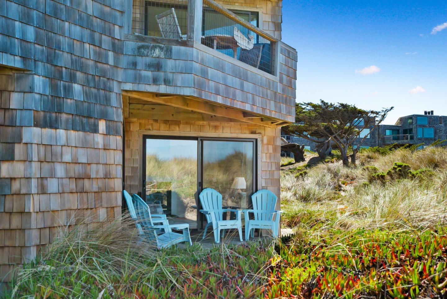 101 Shell Road, Unit 108 Watsonville, CA 95076 - Photo 26 of 38 a front view of a house with a yard