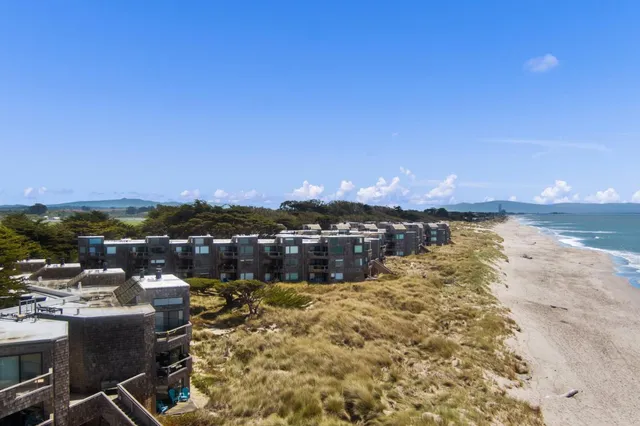 a view of a city with an ocean view