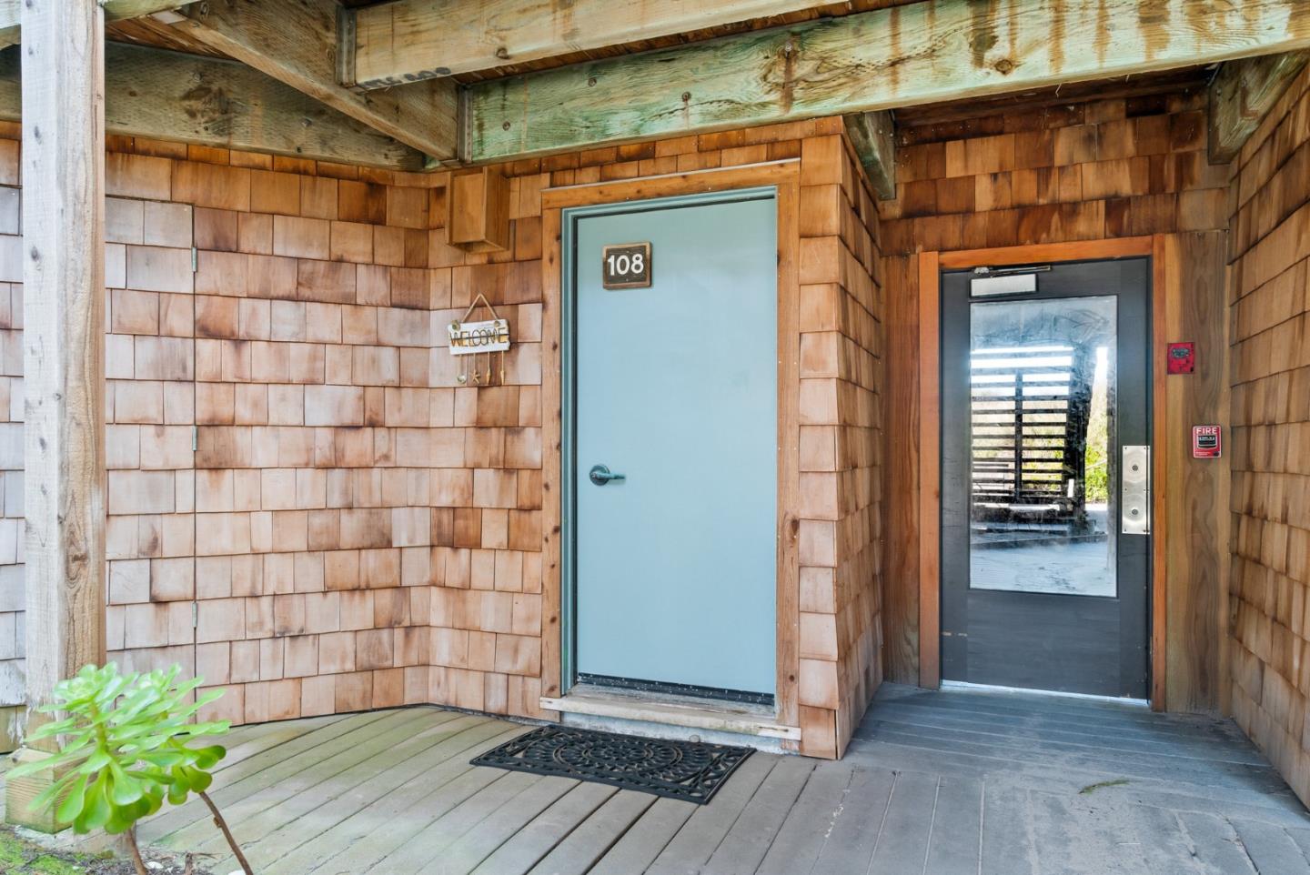 101 Shell Road, Unit 108 Watsonville, CA 95076 - Photo 5 of 38 a view of a wooden door