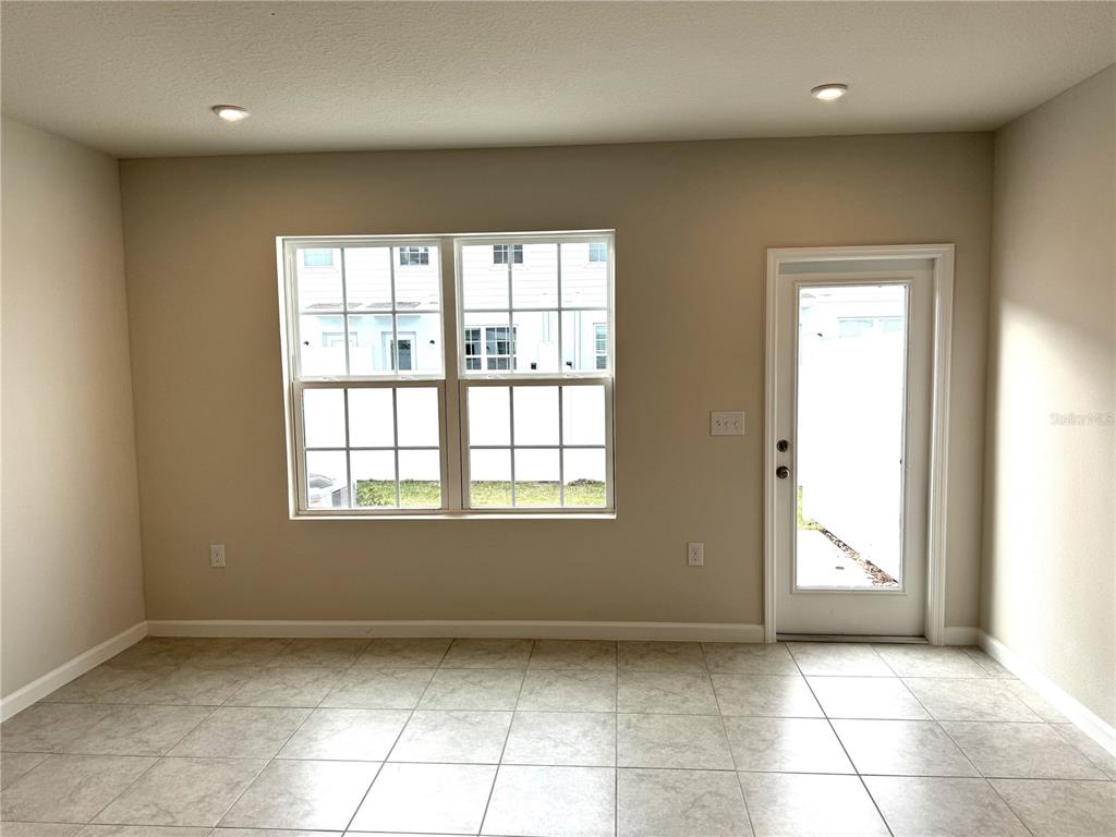 4612 Old Blush Street Lakewood Ranch, FL 34211 - Photo 7 of 19 a view of an empty room with a window