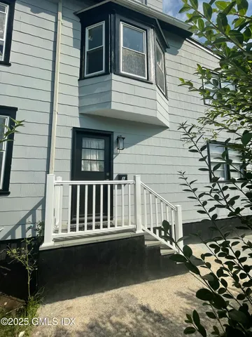 a view of a house with a ocean view