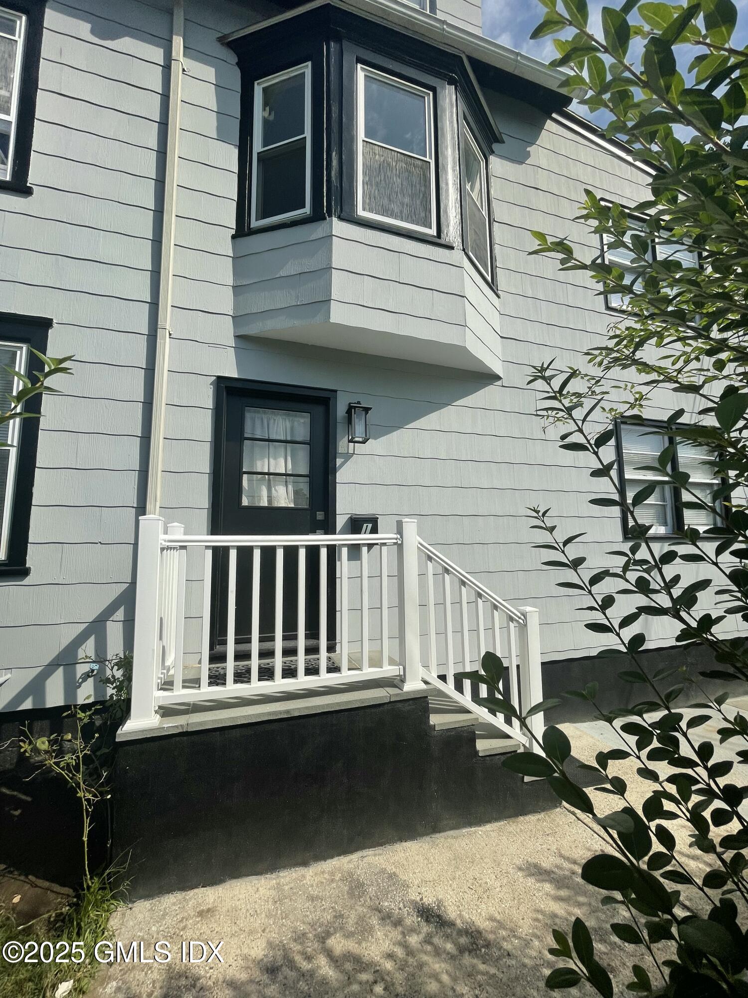 a view of a house with a ocean view