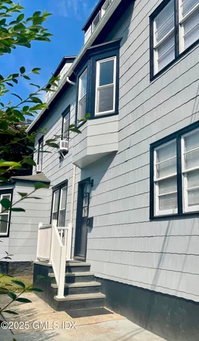 a front view of a house with a window