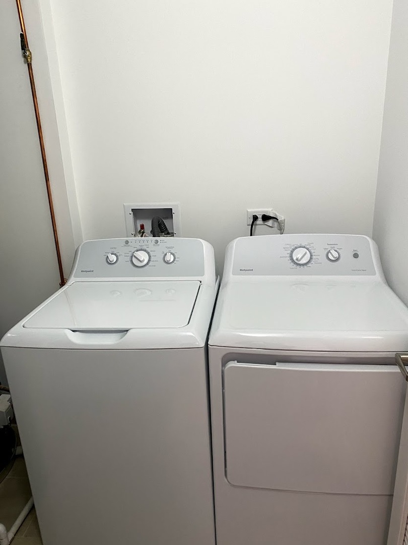 3203 North Ridgeway Avenue, Unit 2B Chicago, IL 60618 - Photo 16 of 17 a utility room with dryer and washer