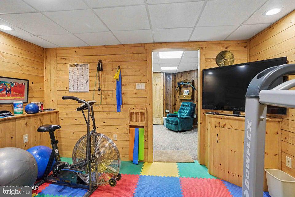 2270 Pine Tree Road Hughesville, PA 17737 - Photo 64 of 90 Cozy fitness space with vibrant flooring.