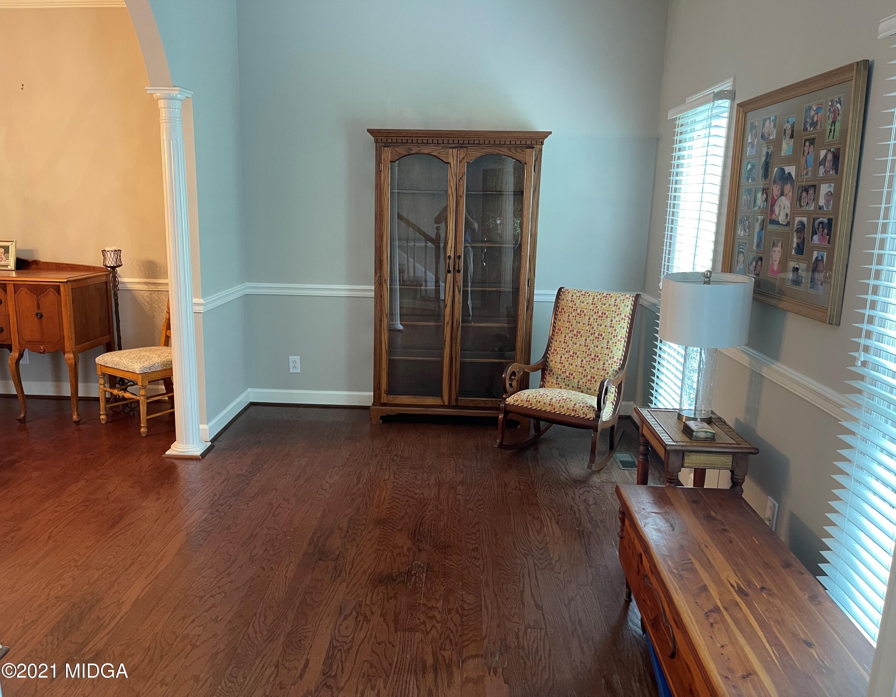 253 Ridge Crest Drive Macon, GA 31210 - Photo 3 of 16 a living room with furniture and a wooden floor