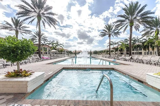 a view of a swimming pool with a chair
