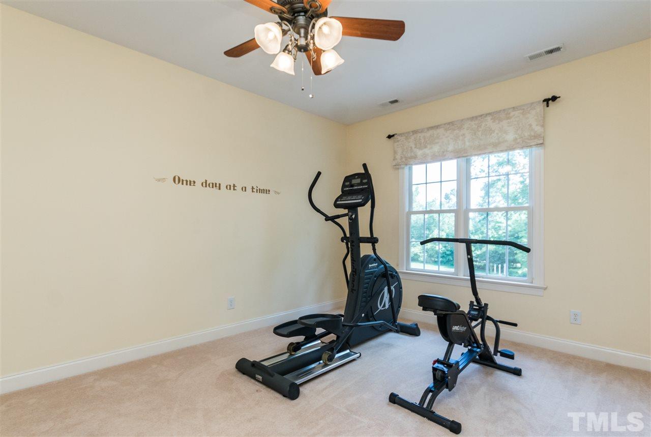 3413 Spartina Court Raleigh, NC 27606 - Photo 21 of 25 a view of a room with gym equipment