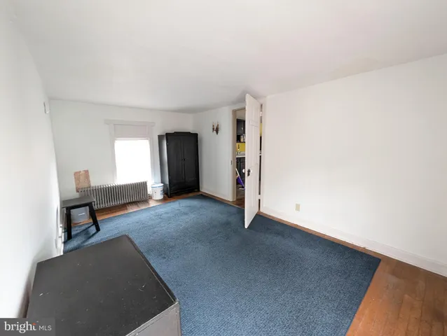 a view of livingroom with furniture and windows