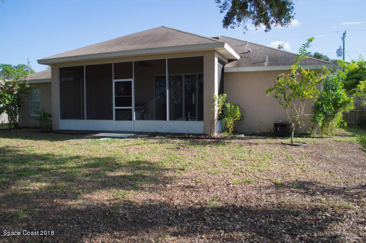 6130 Edison Street Cocoa, FL 32927 - Photo 12 of 15 a view of a house with backyard
