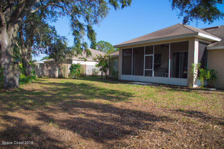 6130 Edison Street Cocoa, FL 32927 - Photo 15 of 15 a view of a house with a yard