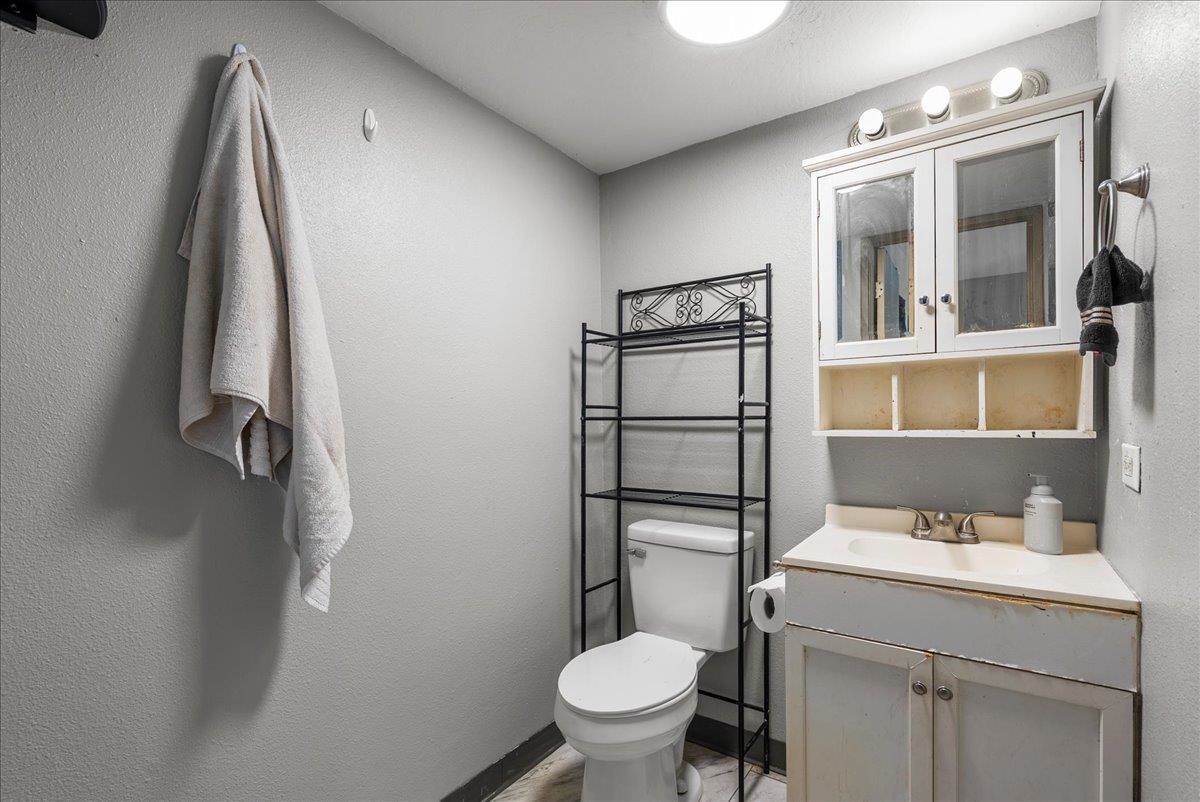 111 Kahului Beach Road, Unit B314 Kahului, HI 96732 - Photo 23 of 32 a bathroom with a toilet sink and shower