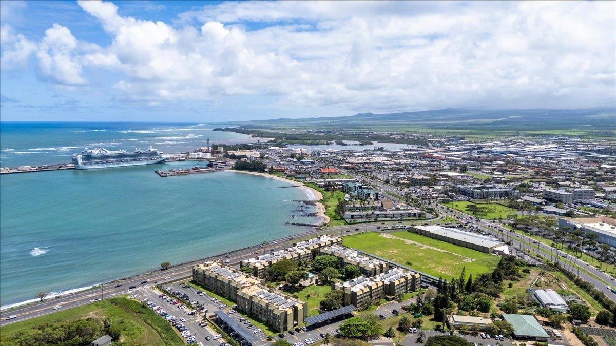 111 Kahului Beach Road, Unit B314 Kahului, HI 96732 - Photo 26 of 32 an aerial view of a house with a swimming pool outdoor seating and yard