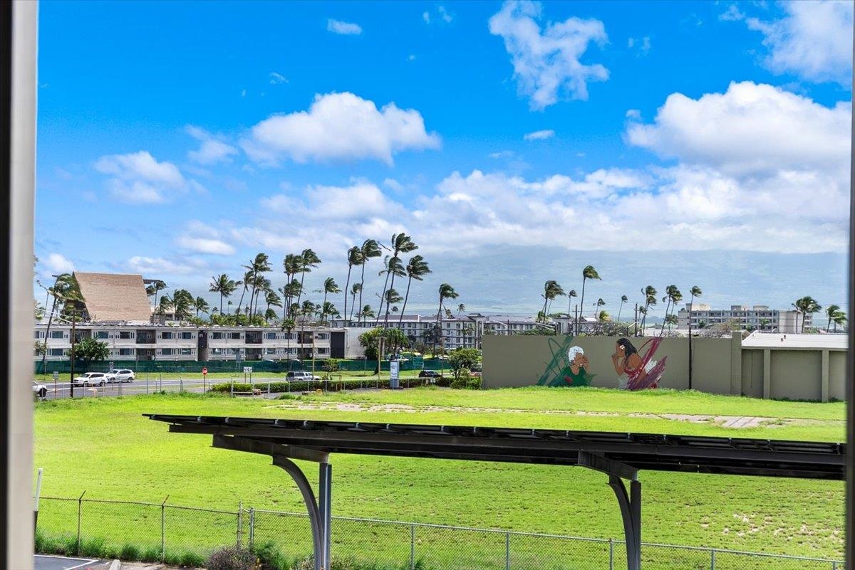 111 Kahului Beach Road, Unit B314 Kahului, HI 96732 - Photo 7 of 32 a view of swimming pool with a yard in front of it