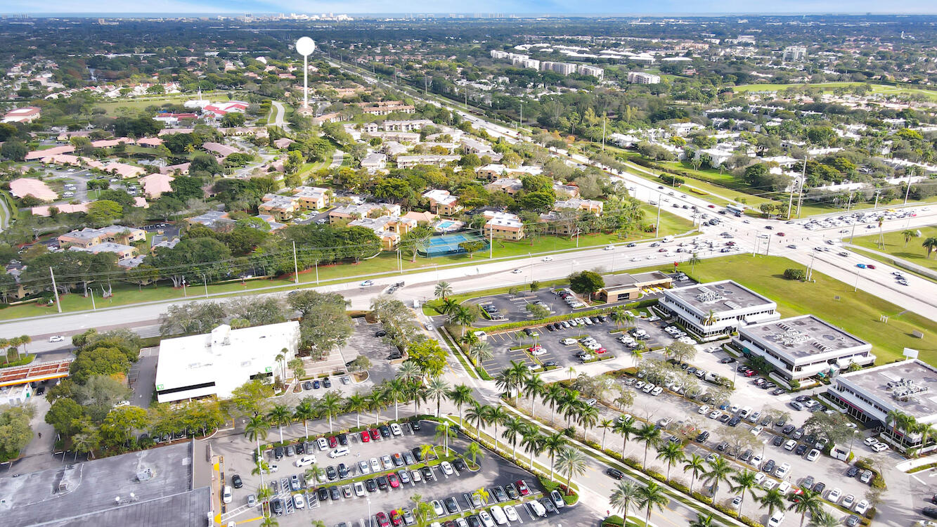 6585 Somerset Drive, Unit 105 Boca Raton, FL 33433 - Photo 38 of 49 GARDEN SHOPS AND COMMUNITY