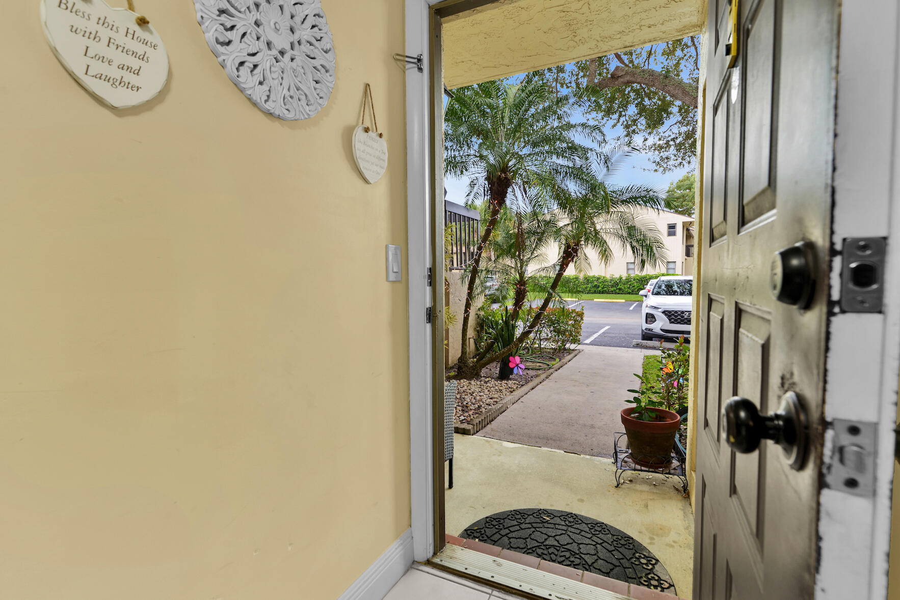 6585 Somerset Drive, Unit 105 Boca Raton, FL 33433 - Photo 5 of 49 ENTRANCE