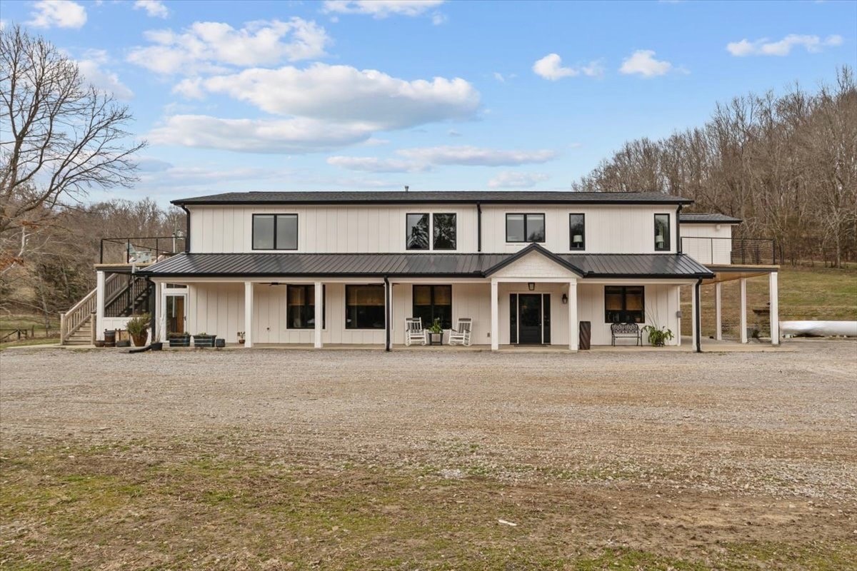 1355 Mitchell Road Pulaski, TN 38478 - Photo 2 of 95 a front view of a house with a garden