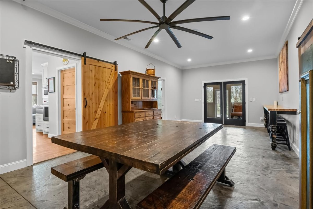 1355 Mitchell Road Pulaski, TN 38478 - Photo 30 of 95 a living room with stainless steel appliances furniture a rug and a large window