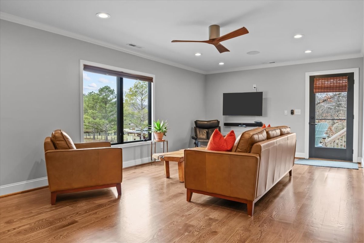 1355 Mitchell Road Pulaski, TN 38478 - Photo 47 of 95 a living room with furniture and a flat screen tv