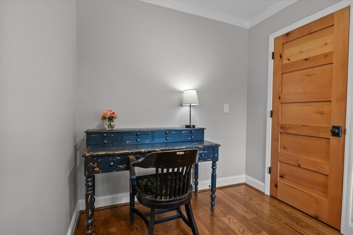 1355 Mitchell Road Pulaski, TN 38478 - Photo 49 of 95 a dining room table with wooden floor and cabinet